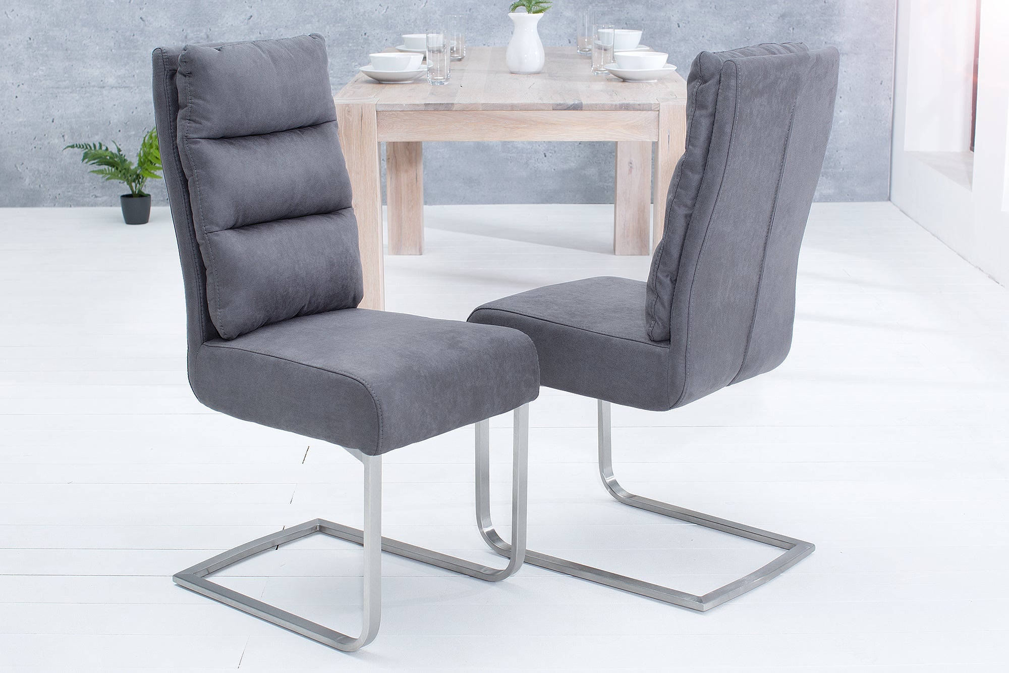 Lote de 2 sillas basculantes de diseño COMFORT en gris vintage con estructura de acero inoxidable