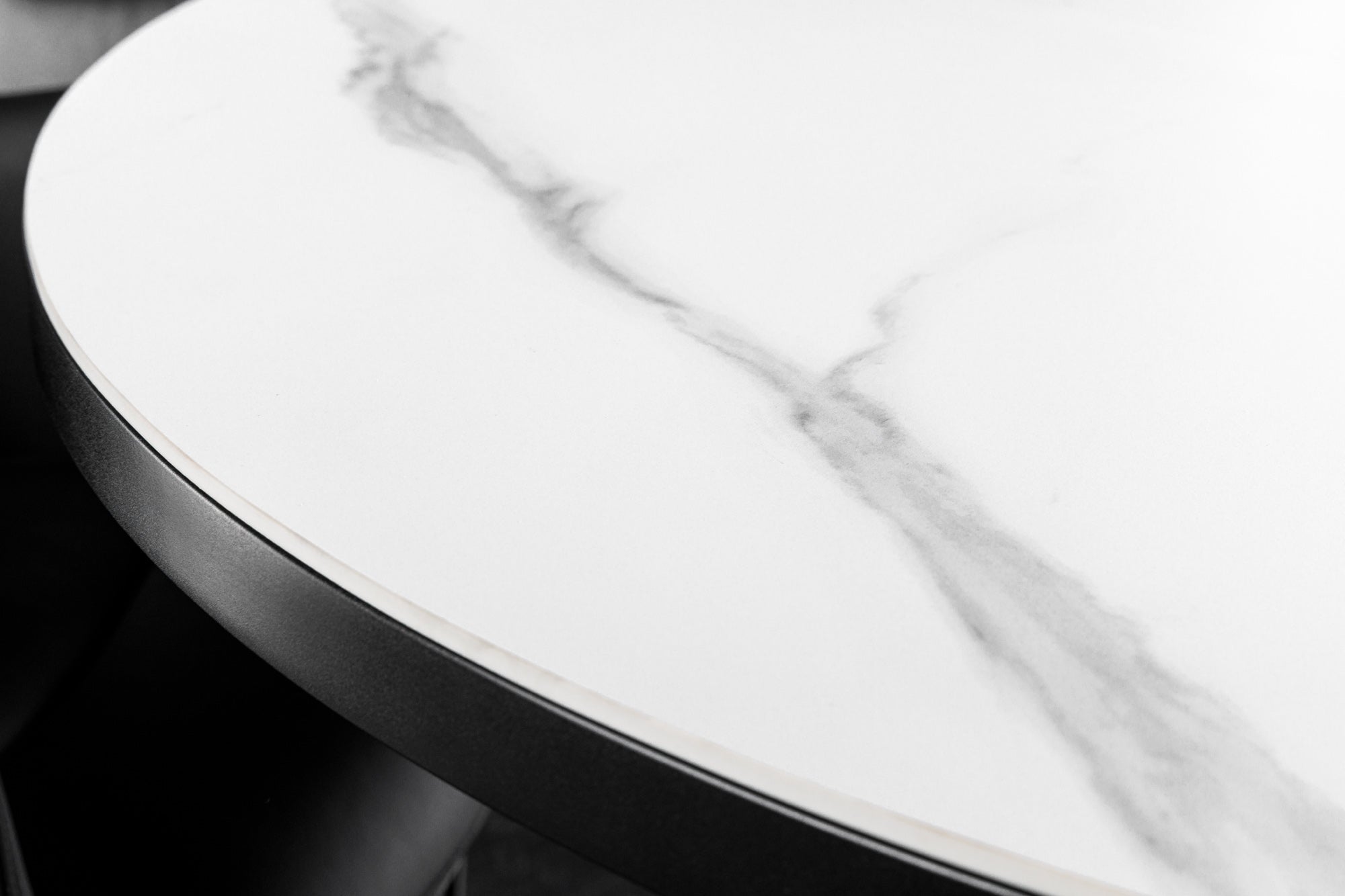 Table à manger extensible MIKADO 120-160 cm en céramique blanche ovale avec structure étoile noire