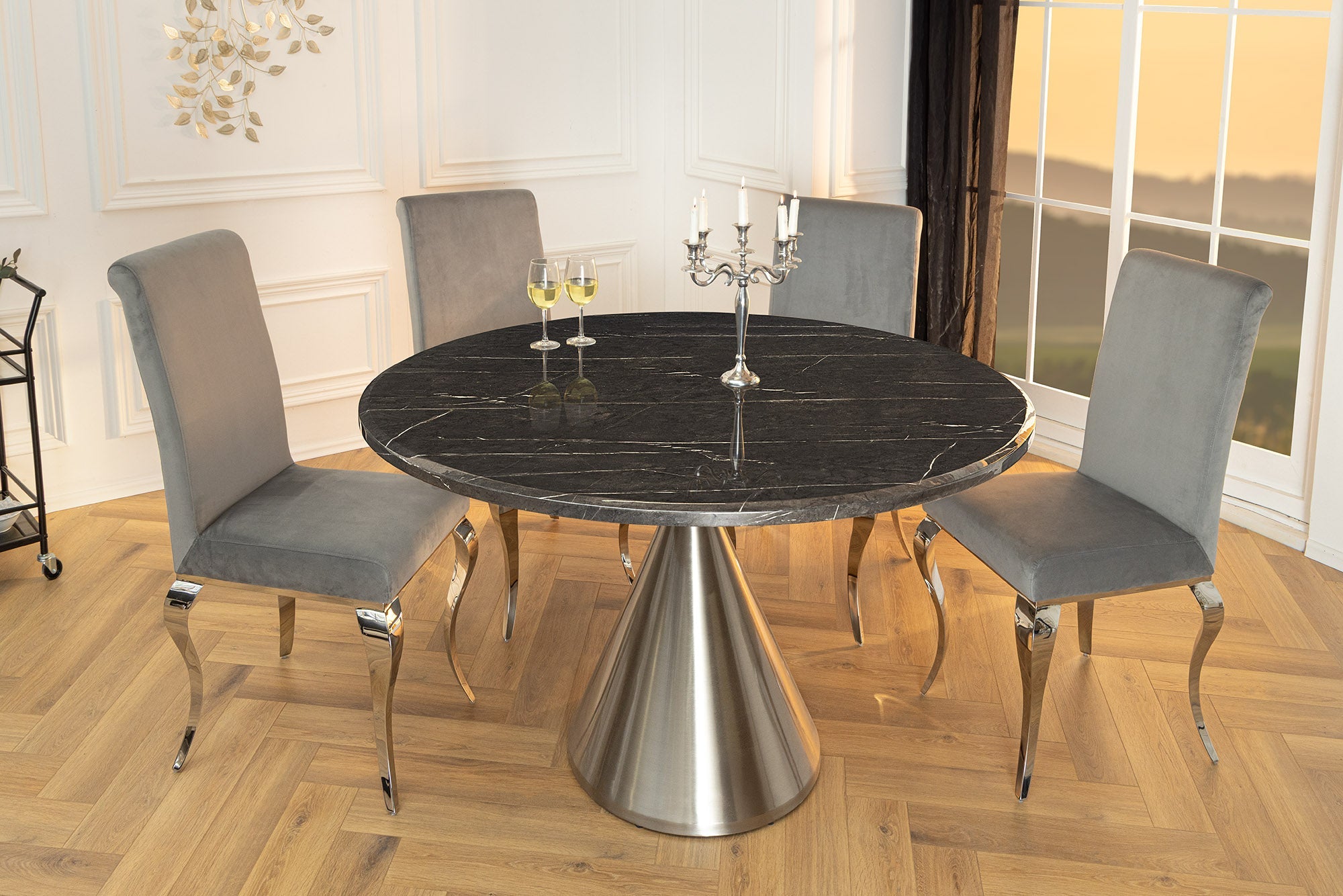 Table à manger ronde ELEGANCIA 130 cm en marbre noir et acier chromé avec base colonne