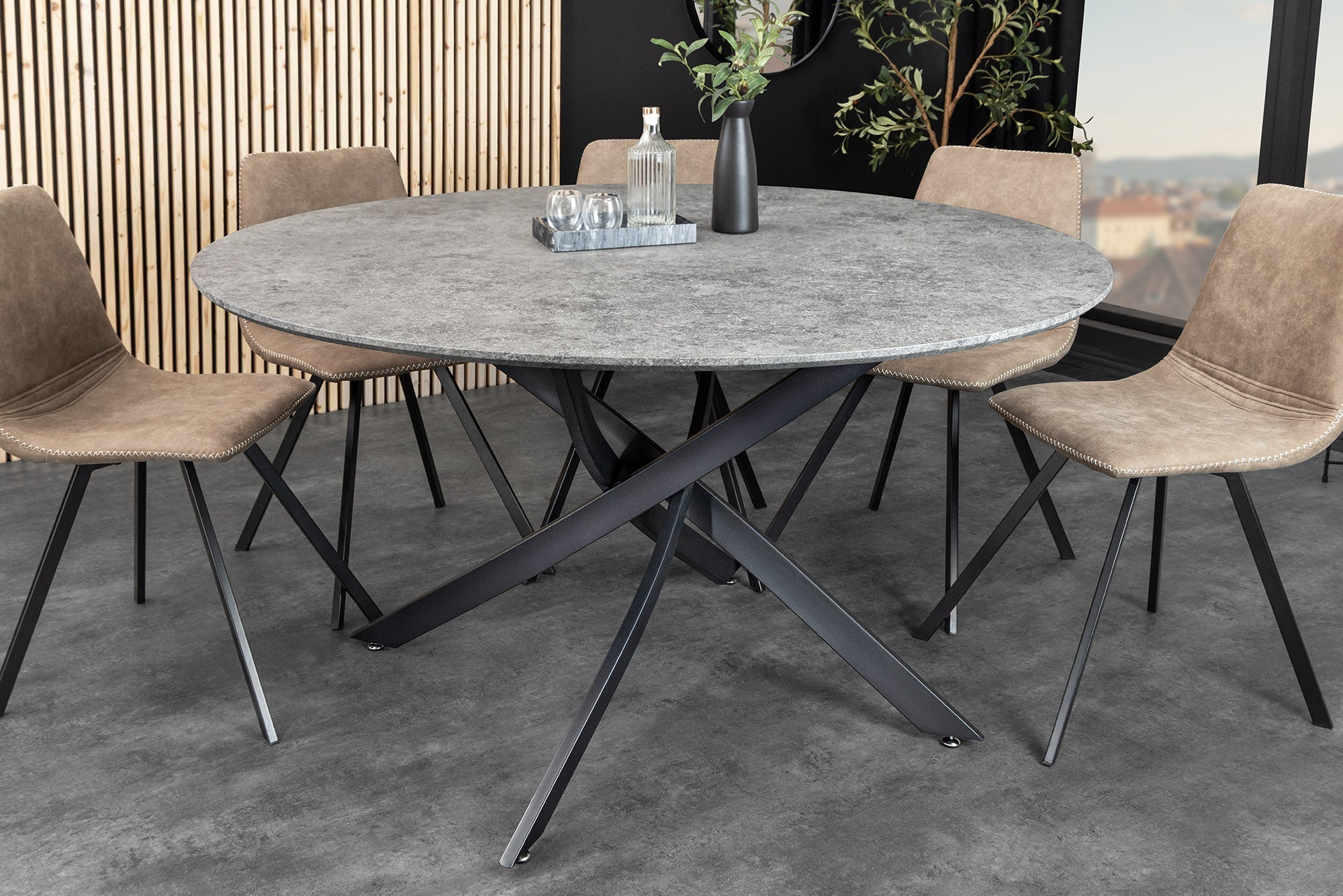 Table à manger ronde HELIX 120cm design béton gris pieds métal noir structure étoile