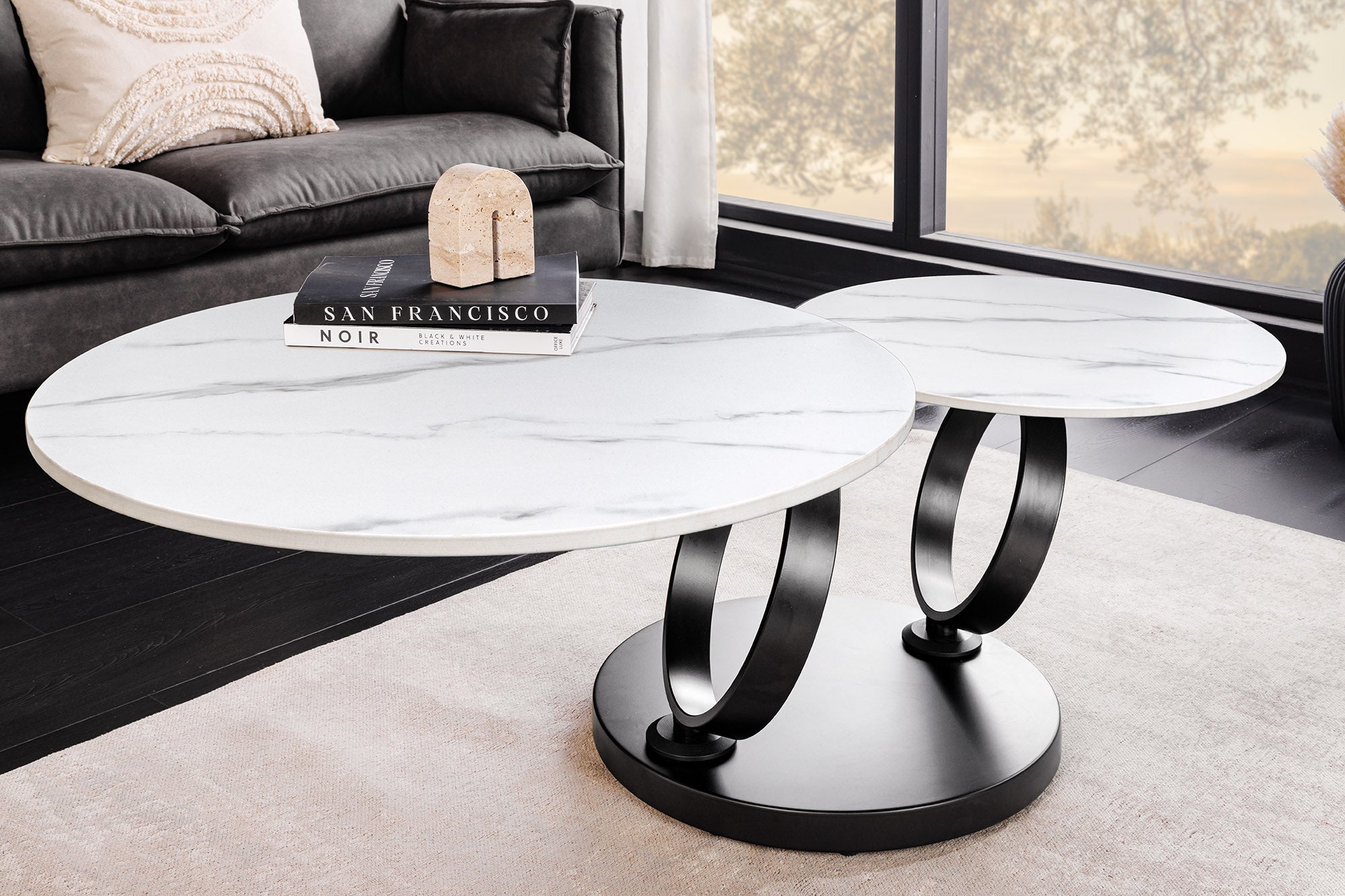 Table basse design DANCING RINGS blanche ronde tournante marbre céramique noir métal