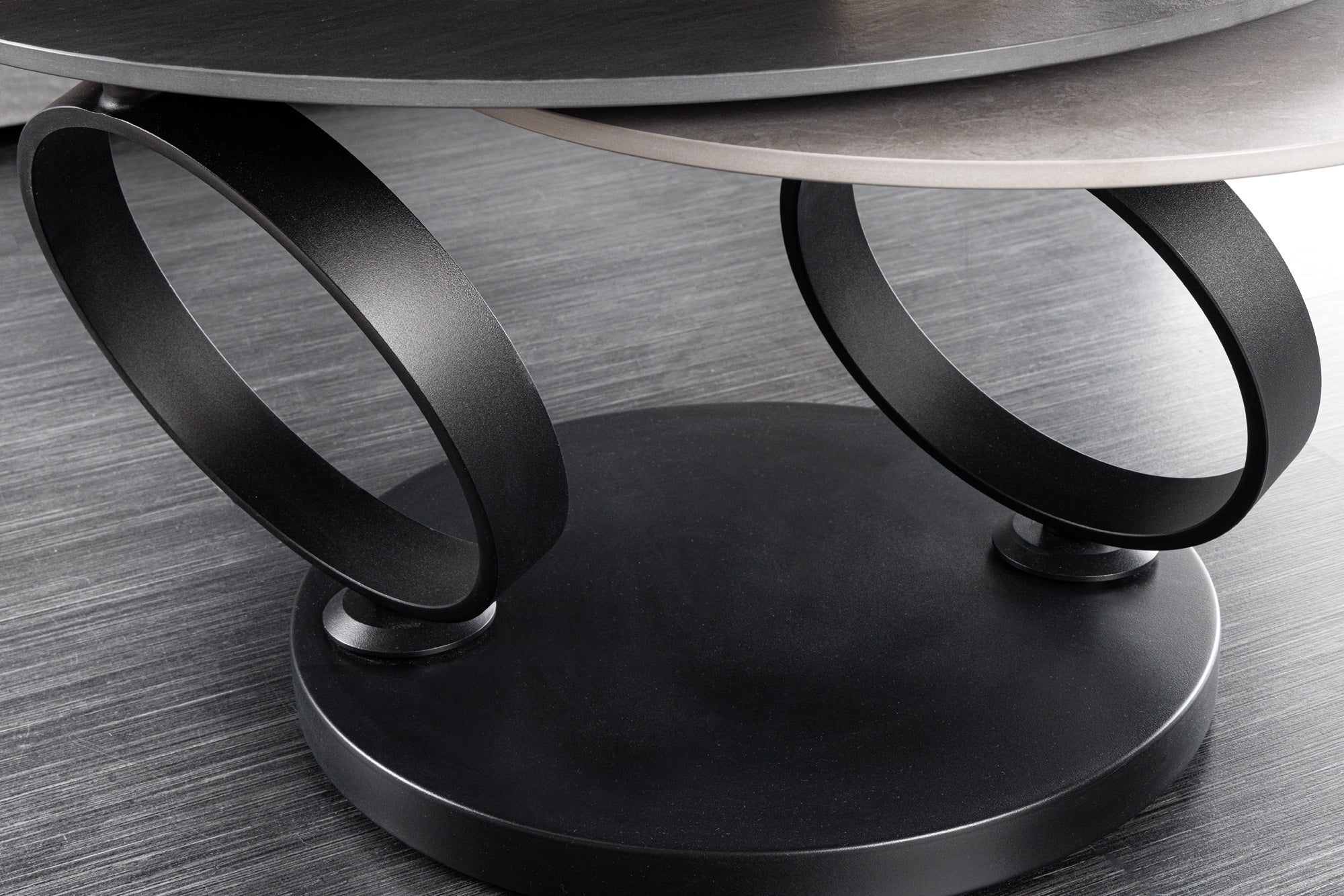 Table basse design DANCING RINGS noire grise ronde rotative céramique métal