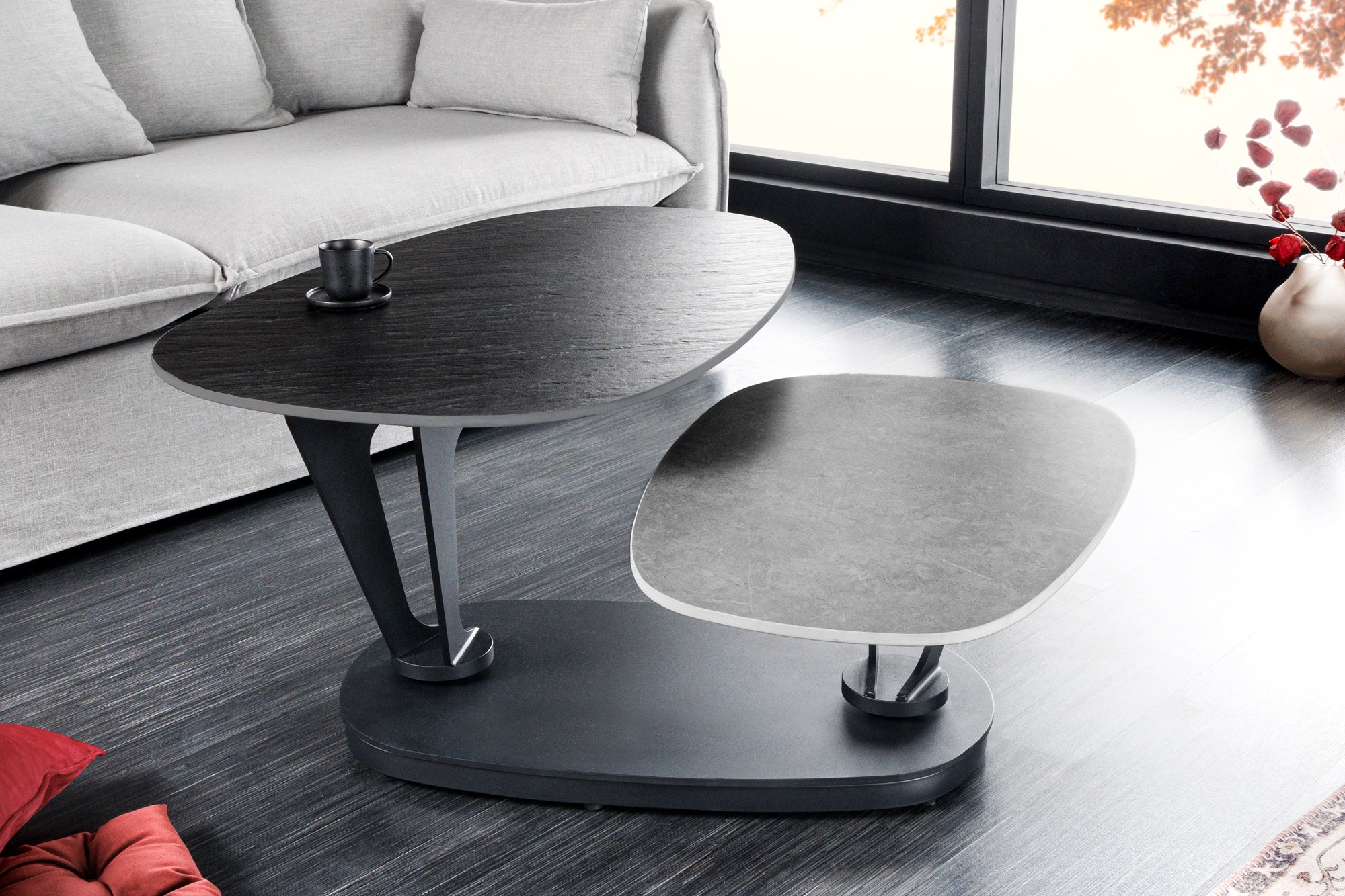 Table basse design MOVEMENT noire grise ronde rotative en céramique avec structure en métal