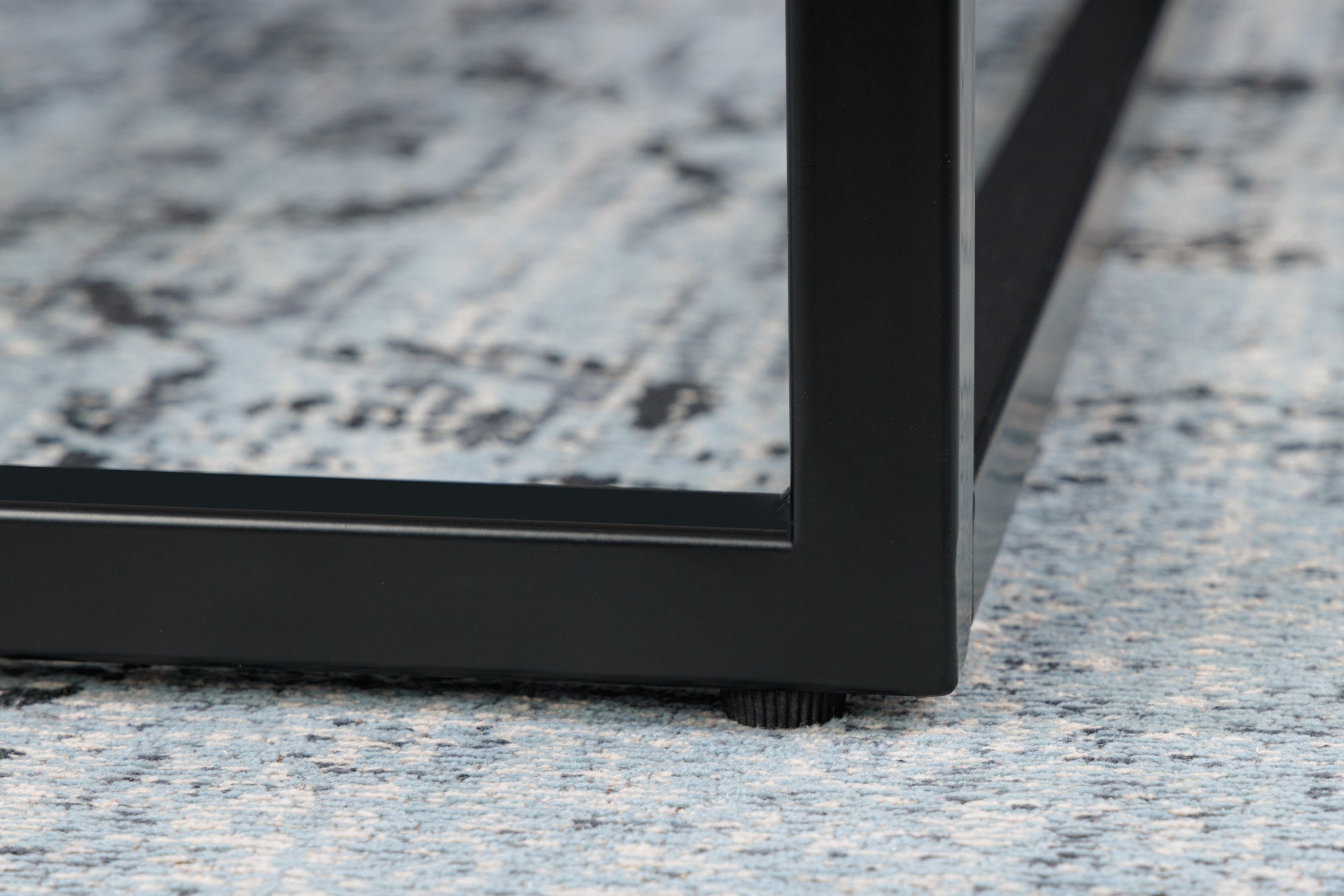 Table basse élégante BOUTIQUE 90cm verre cristal blanc décor marbre cadre noir