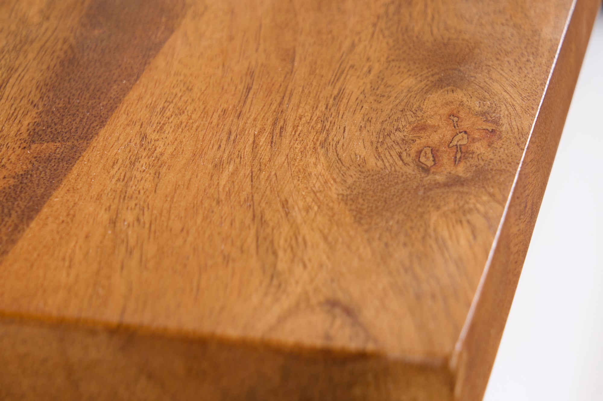 Table basse massive AMAZONAS 110cm bois de manguier métal noir bord d'arbre finition miel