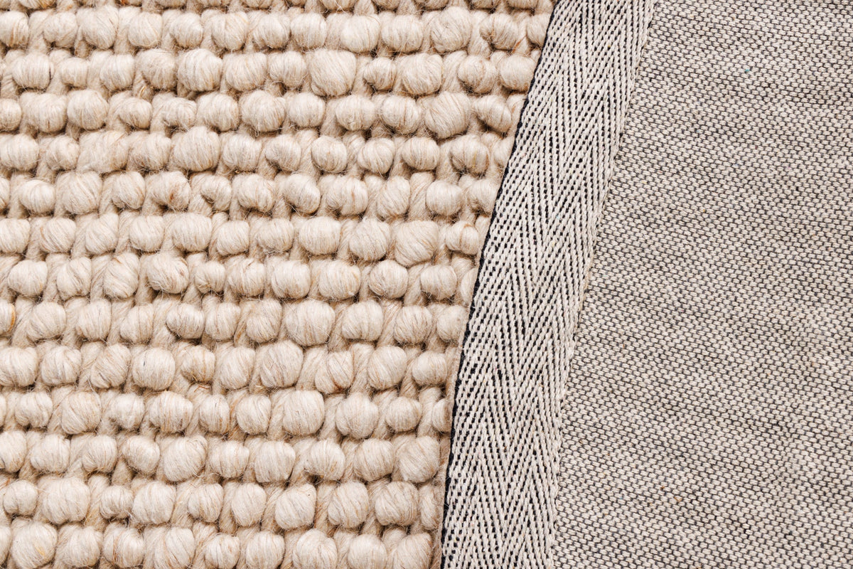 Tapis design LAINE 150cm beige rond en laine fait main