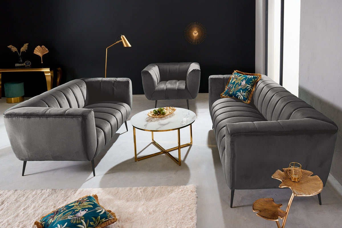 Fauteuil rétro NOBLESSE 105cm velours gris pieds métal noir âme à ressorts matelassage décoratif