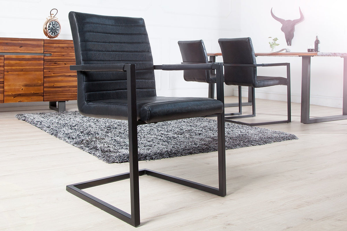 Lot de 2x Chaise cantilever industrielle LOFT simili cuir noir antique avec accoudoirs structure en fer