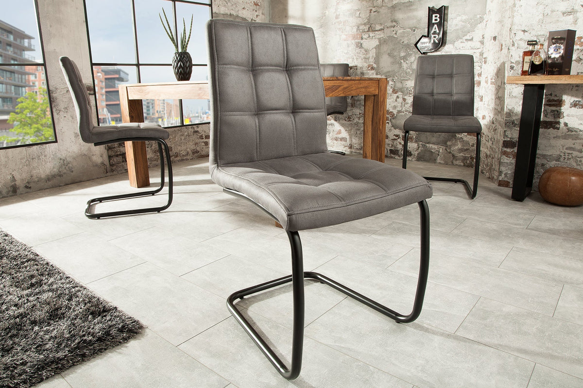 Lot de 4x Chaise cantilever industrielle MODENA gris vintage avec matelassage décoratif