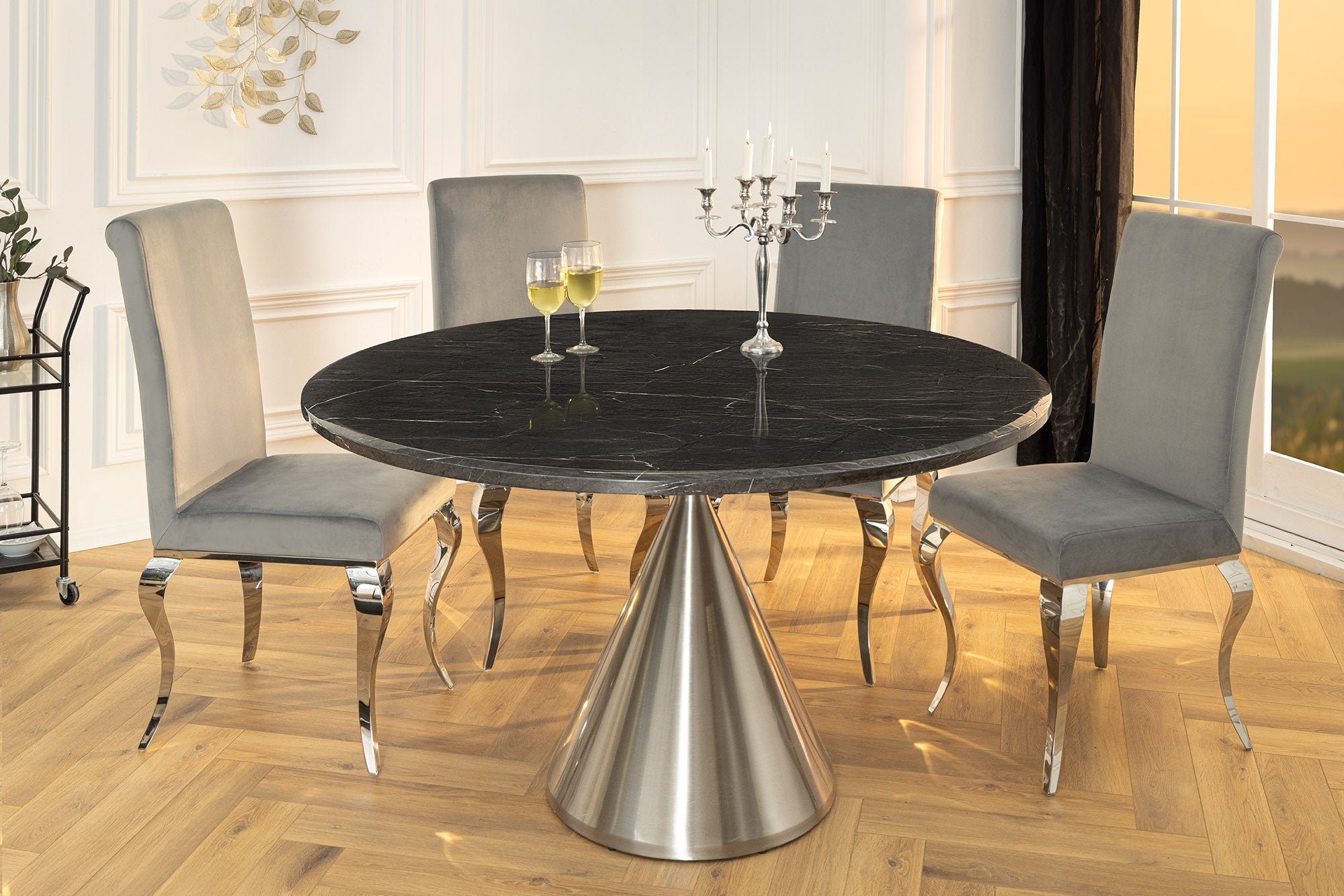 ELEGANCIA Mesa de comedor redonda de 130 cm en mármol negro y acero cromado con base de columna
