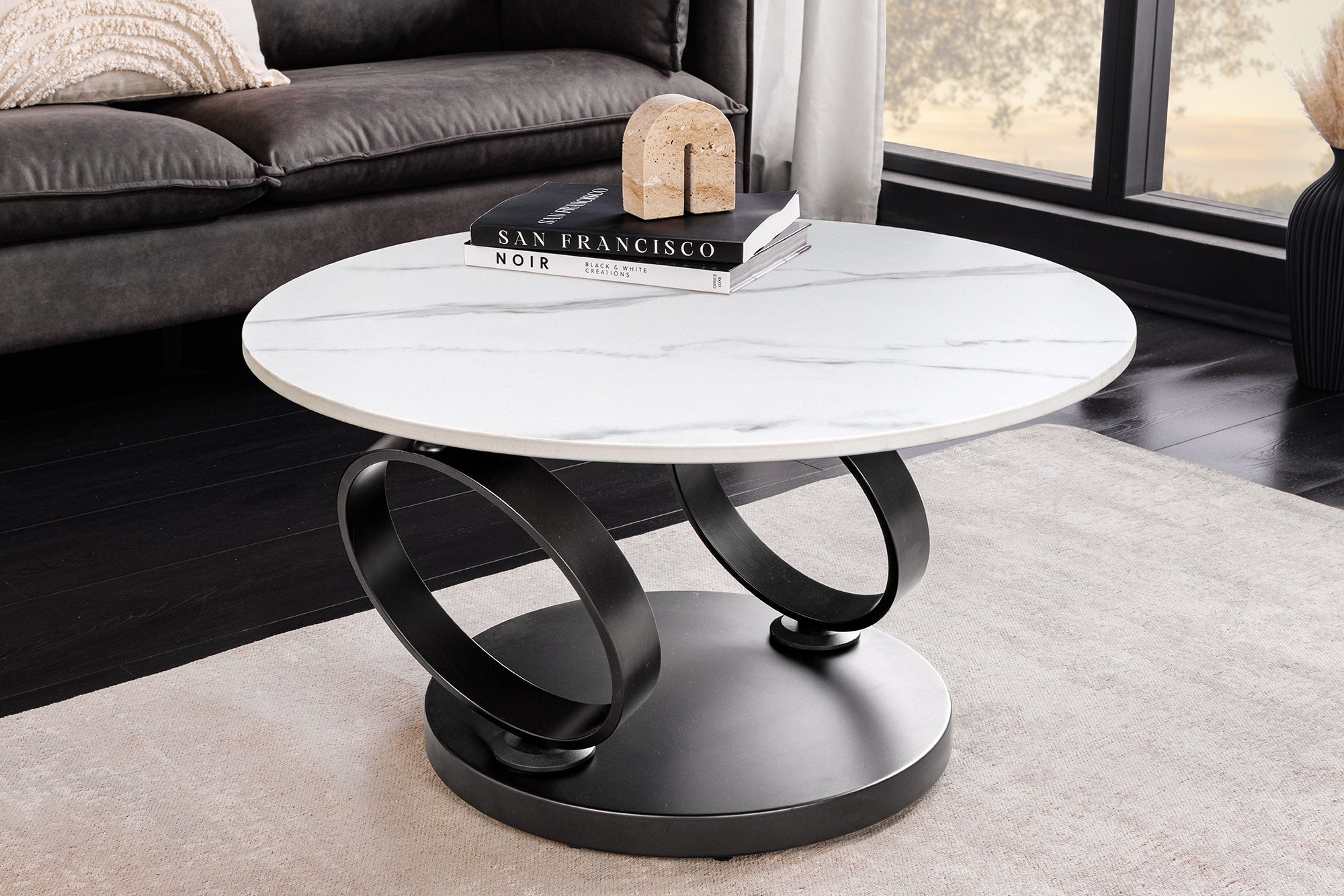 Table basse design DANCING RINGS blanche ronde tournante marbre céramique noir métal