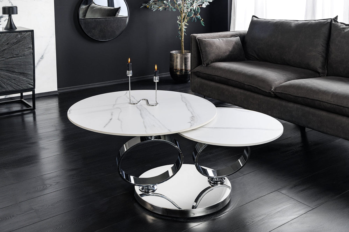 Table basse design DANCING RINGS ronde blanche tournante en marbre céramique structure chromée