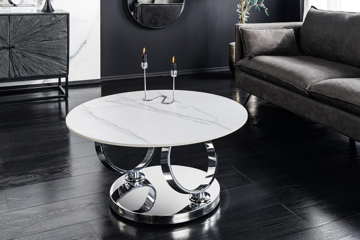 Table basse design DANCING RINGS ronde blanche tournante en marbre céramique structure chromée