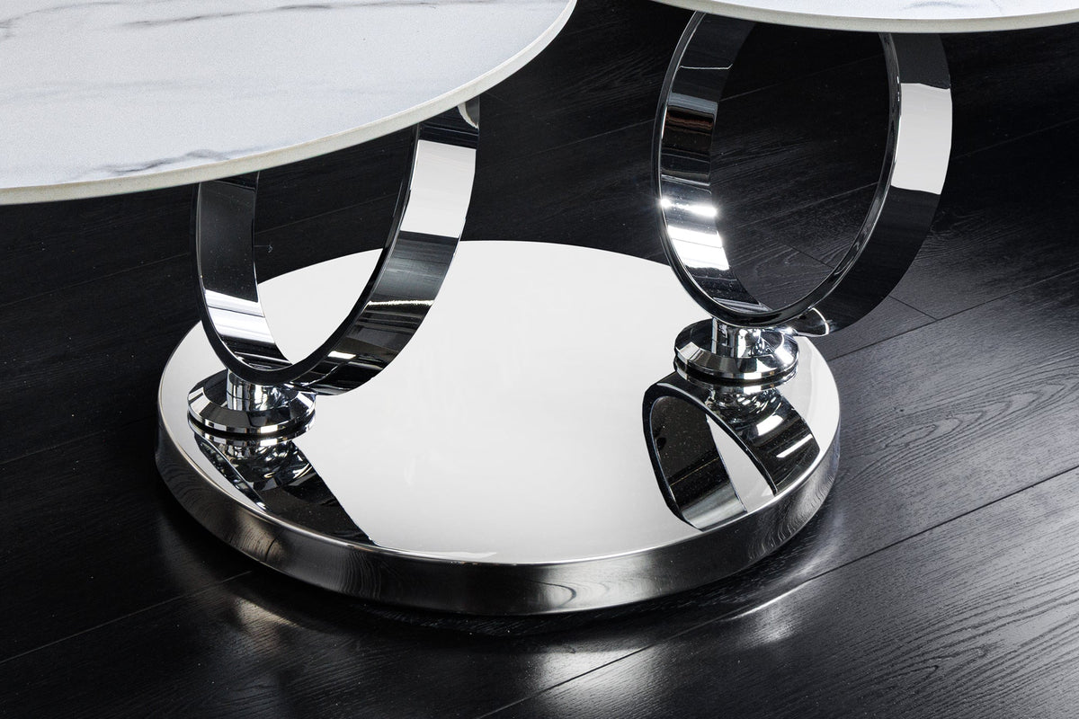 Table basse design DANCING RINGS ronde blanche tournante en marbre céramique structure chromée