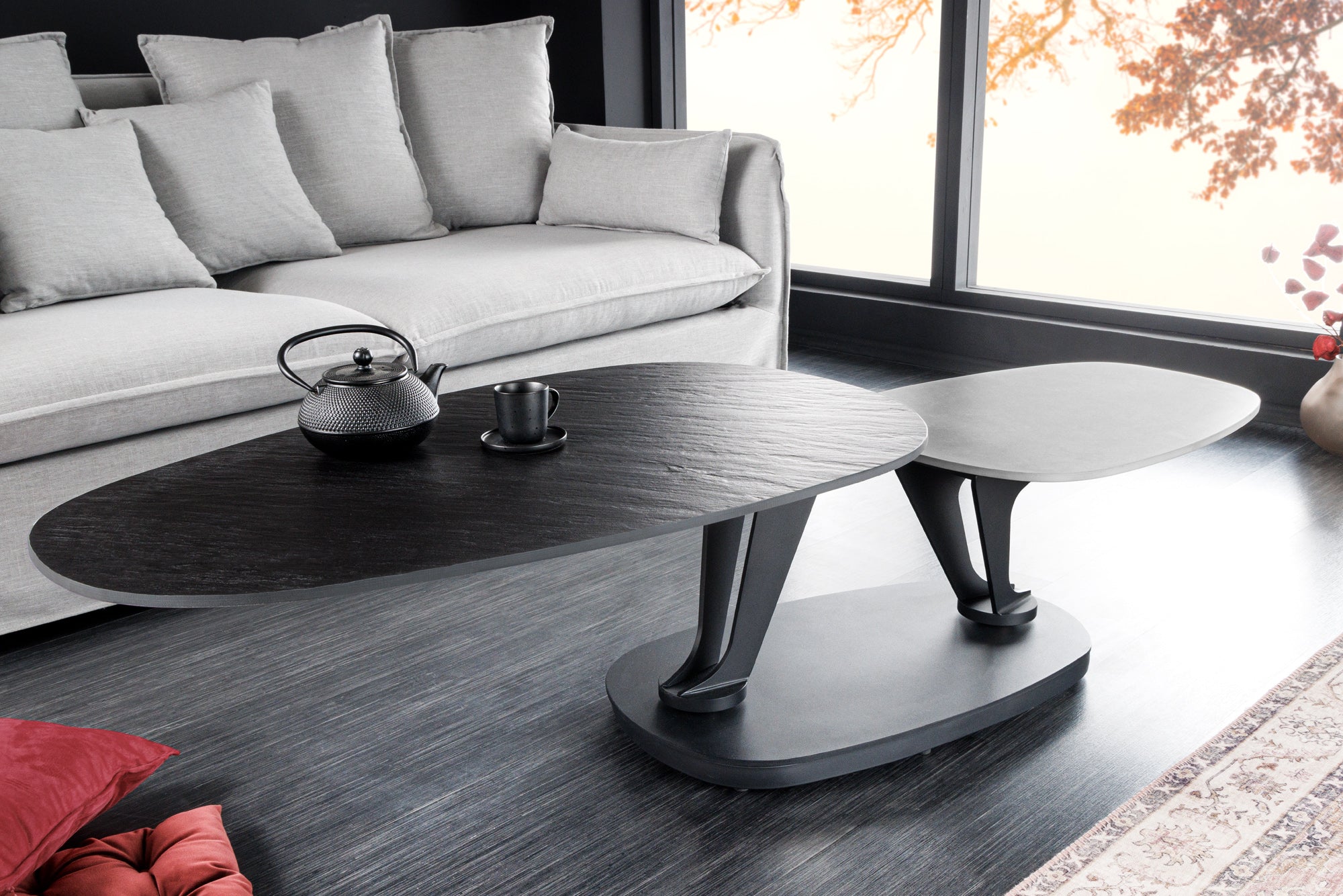 mesa de centro-diseño-movimiento-negro-gris-redonda-rotativa-ceramica-con-estructura-metal_44235 (inv)