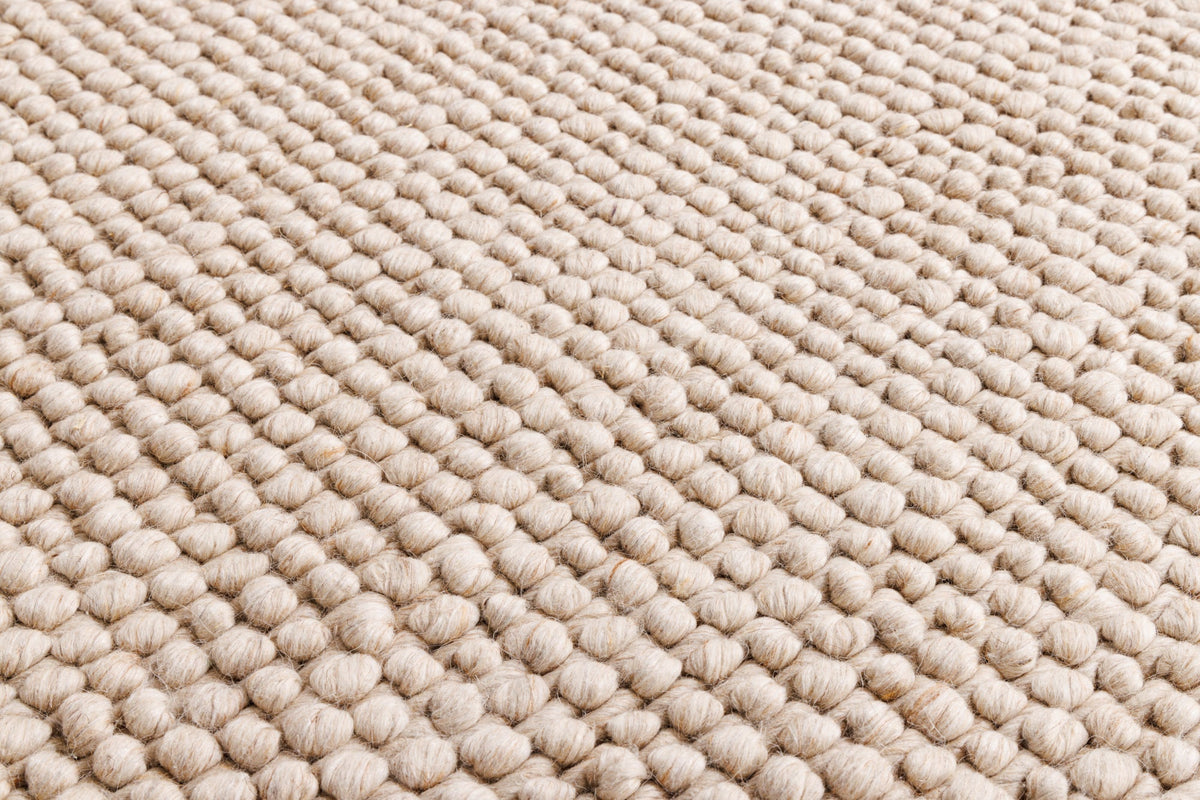 Tapis design LAINE 150cm beige rond en laine fait main