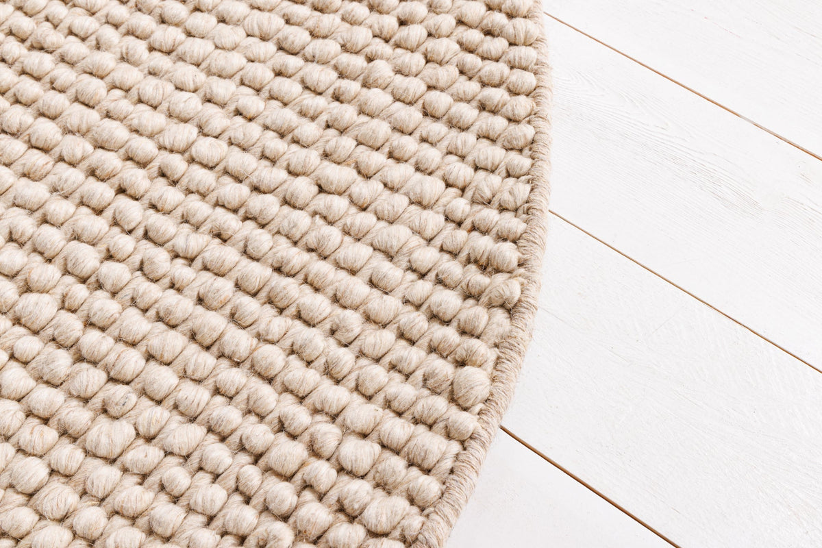 Tapis design LAINE 150cm beige rond en laine fait main